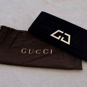 Brand new, never been worn black suede and leather Gucci clutch with dustbag